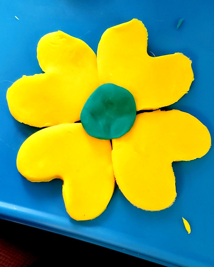 yellow flower made out of play doh.